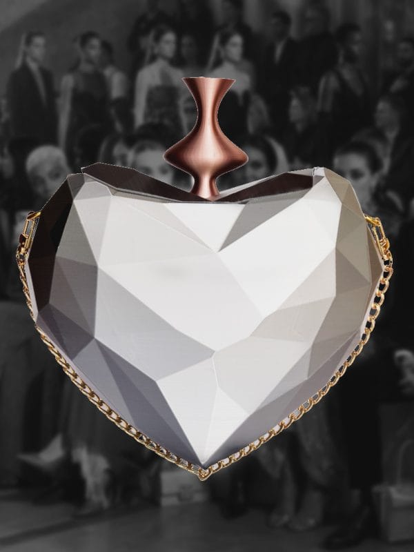 Bolso Dádiva diseñado por GalloBuey para la colección de Juan Duyos, corazón plata esculpido en 3D con tecnología paramétrica propia