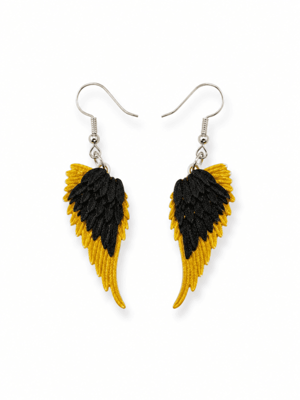 Alas (19) accesorios para festivales y ofertas de verano, Pendientes Alas de Ángel de Gallobuey en fondo neutro