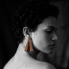 brown planes Model wearing women's long paper airplane autumn earrings