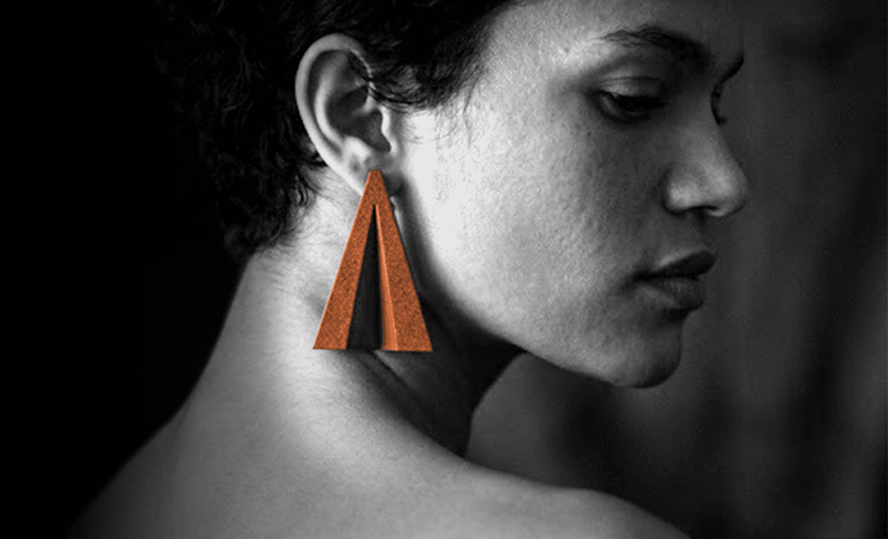 Woman wearing matte white Canary hoop earrings, highlighting the crescent moon design with a minimalist and modern style.