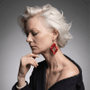 flame Woman wearing long autumn flamma earrings