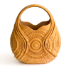 Bolso de lujo Serendipia impreso en 3D color ocre dorado con patrones geométricos y curvas orgánicas.